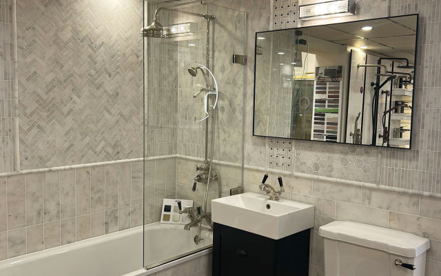 Grey tiles in a traditional bathroom setting showcasing modern design elements.