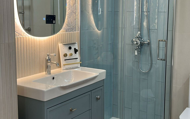 Stylish shower cubicle with basin unit